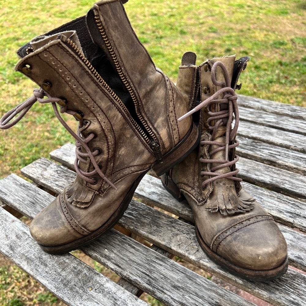 All Saints distressed leather combat boots size 37 (7 US) with “Kiltie” fringe.